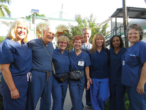 From left to right, Mary Ella Carter, plastic surgeon, Al Fleury plastic surgeon, Colette Magnant, breast surgeon and general surgeon, Sally Reinholdt, operating room nurse, Andrew Umhau, internal medicine, Missy Stockstill, recovery room nurse, Marjorie Brennan, pediatric anesthesiologist, and Kitty Haywood, operating room physicians assistant.