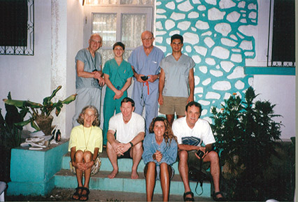 Bill (top far left) and Keena (seated bottom row far left) in front of the Doctors’ Residence